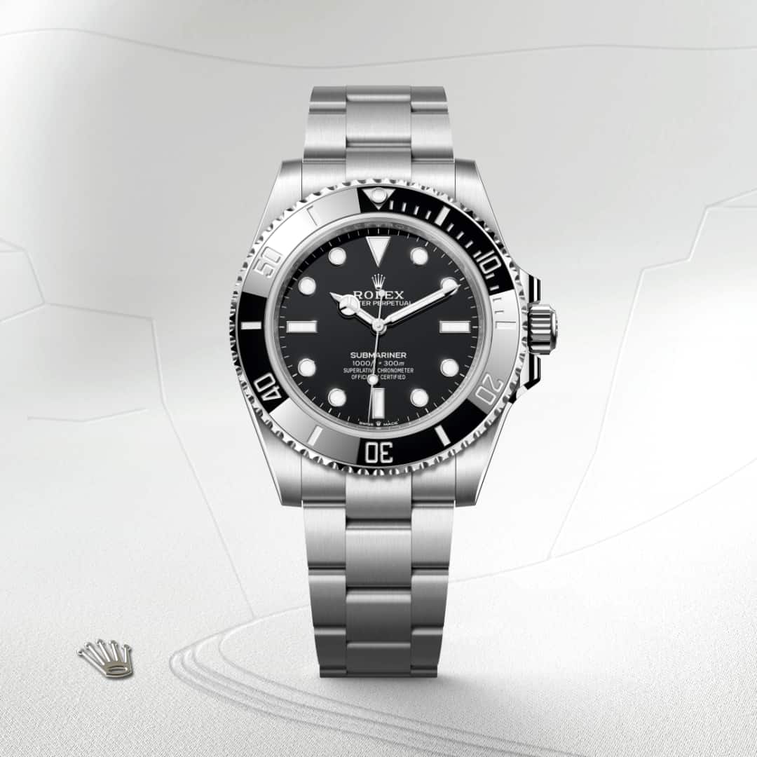 Rolex Submariner in Oystersteel with a black dial, unidirectional rotatable 60-minute graduated, scratch-resistant cerachrom insert in black ceramic, numerals and graduations coated in platinum bezel, and Oyster bracelet.