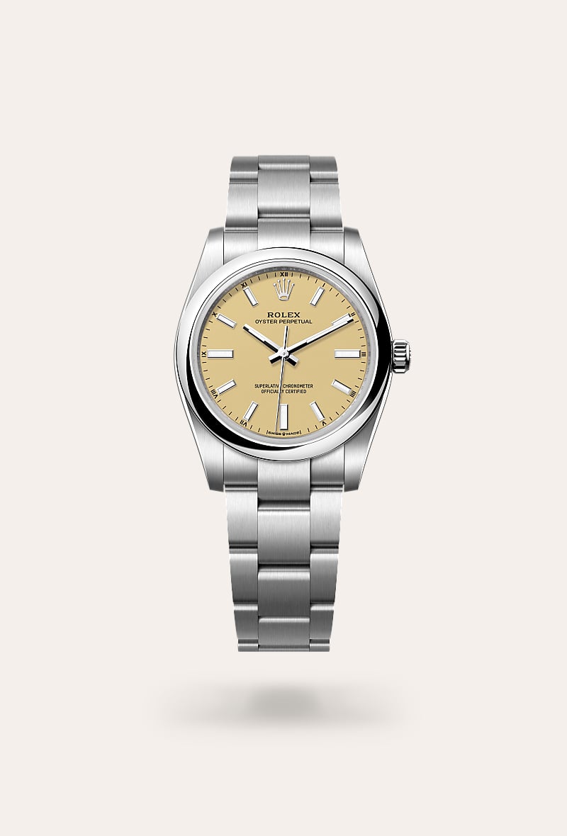 Rolex Oyster Perpetual 34 in Oystersteel with a beige dial, domed bezel, and Oyster bracelet.
