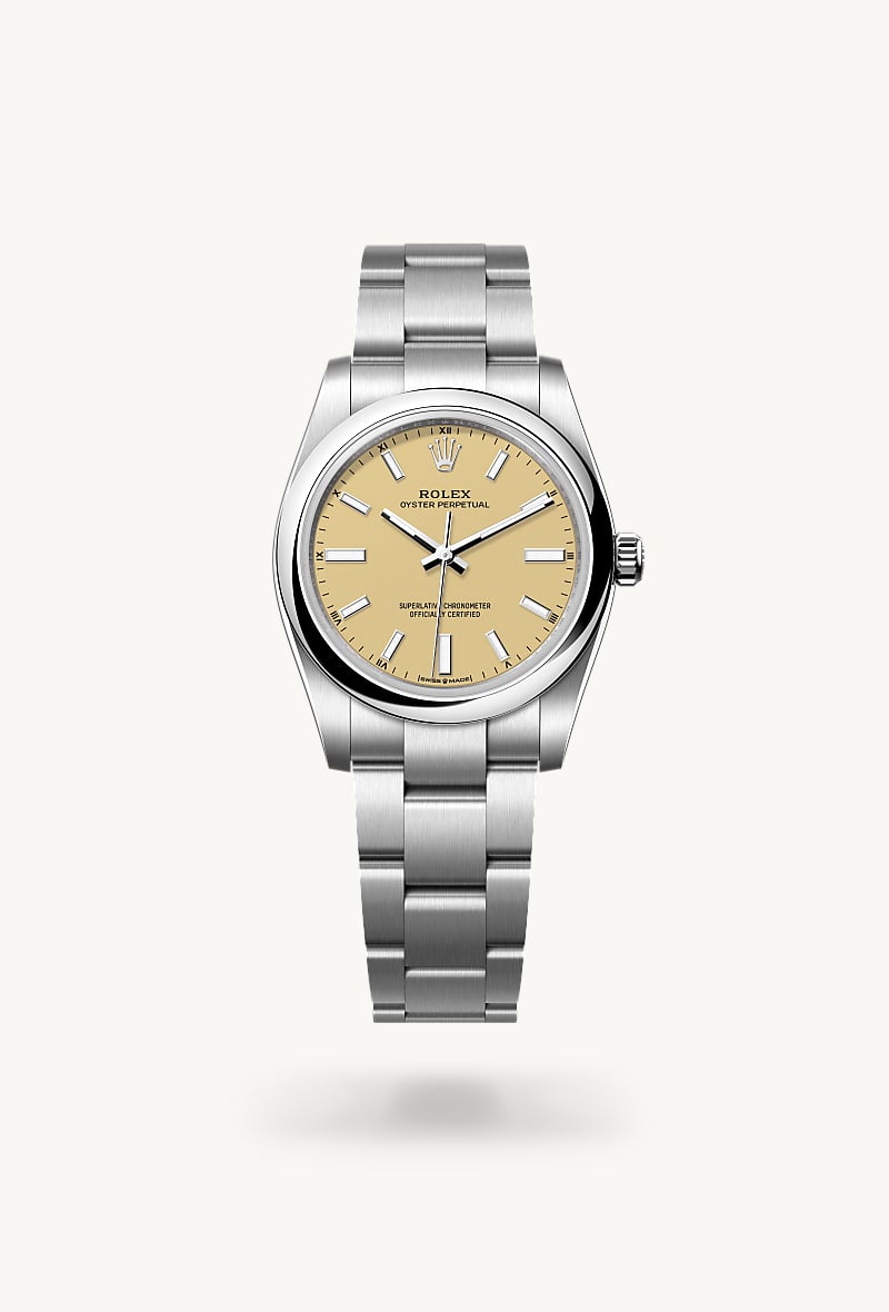 Rolex Oyster Perpetual 34 in Oystersteel with a beige dial, domed bezel, and Oyster bracelet.