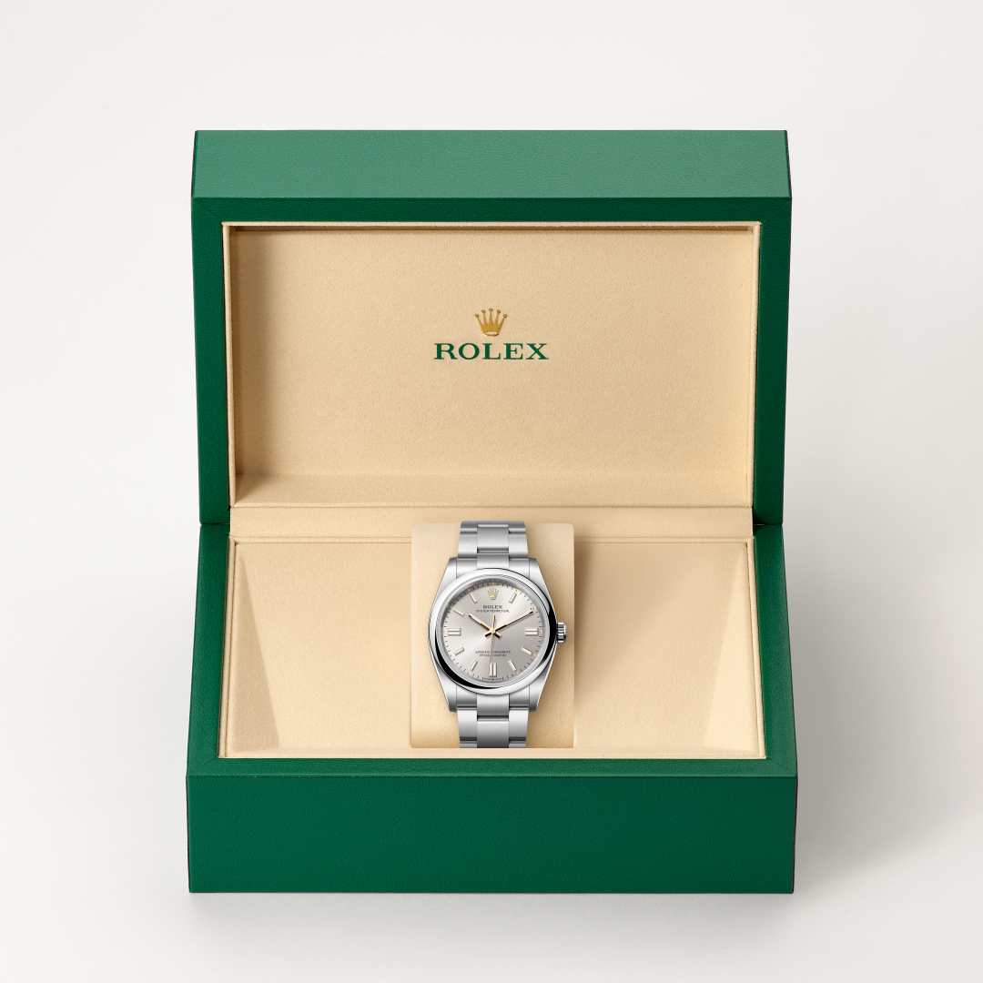 Rolex Oyster Perpetual 36 in Oystersteel with a silver dial, domed bezel, and Oyster bracelet.