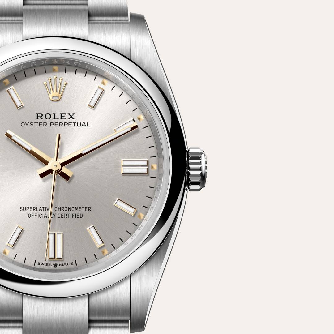 Rolex Oyster Perpetual 36 in Oystersteel with a silver dial, domed bezel, and Oyster bracelet.