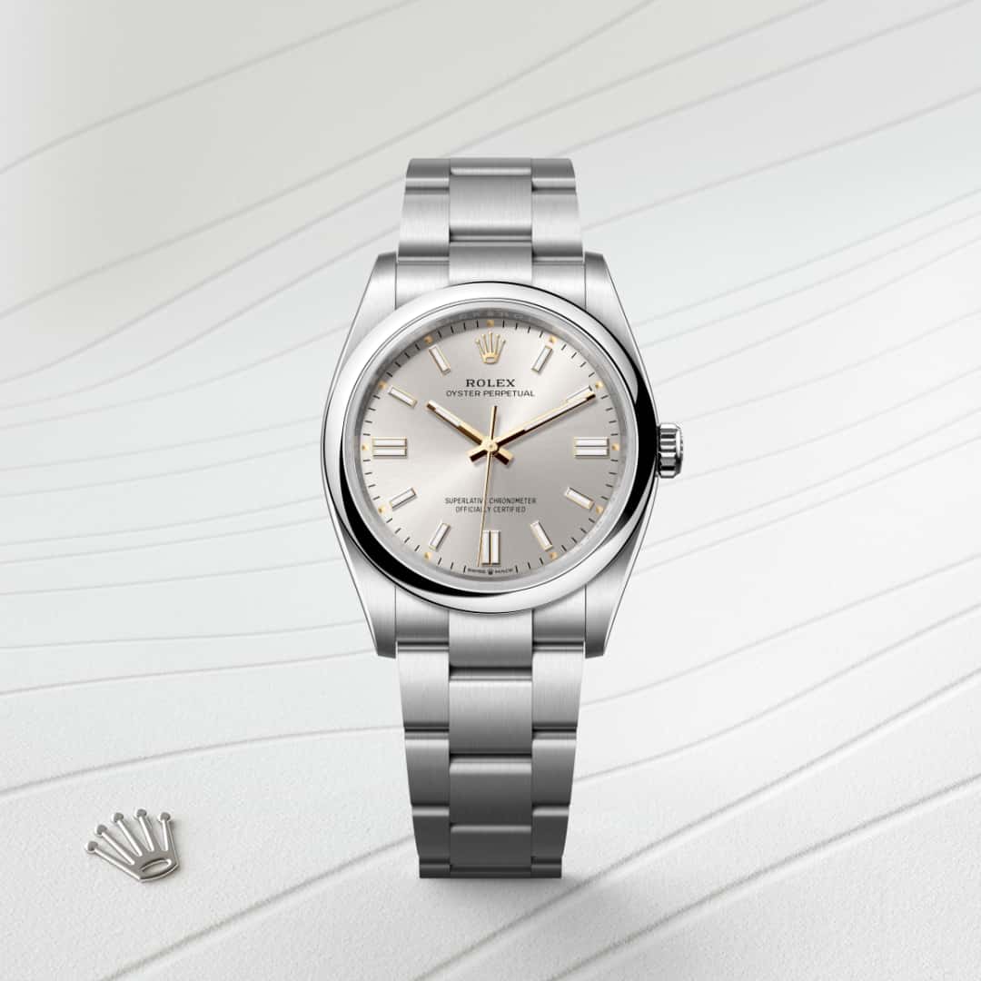 Rolex Oyster Perpetual 36 in Oystersteel with a silver dial, domed bezel, and Oyster bracelet.