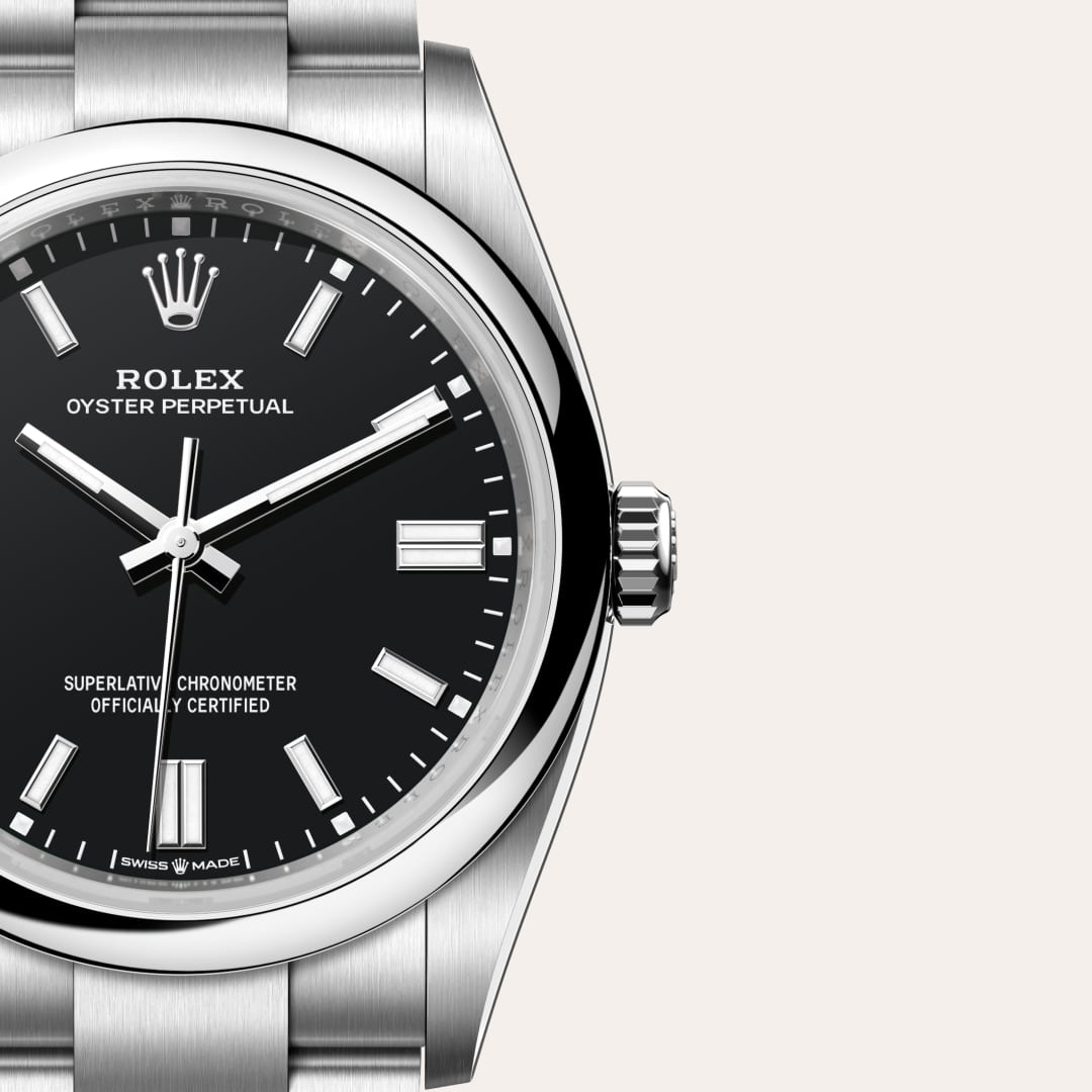 Rolex Oyster Perpetual 36 in Oystersteel with a black dial, domed bezel, and Oyster bracelet.