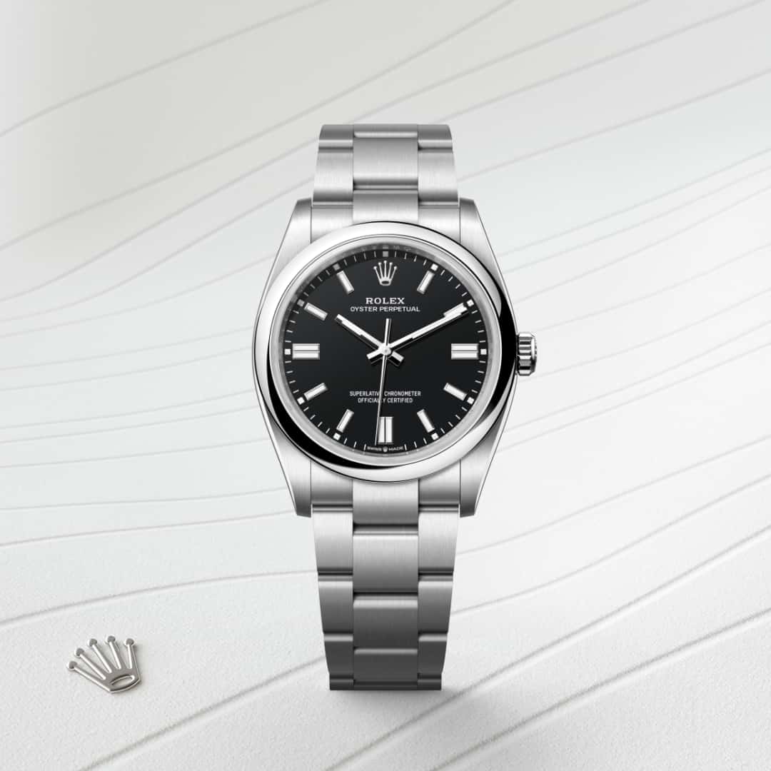 Rolex Oyster Perpetual 36 in Oystersteel with a black dial, domed bezel, and Oyster bracelet.