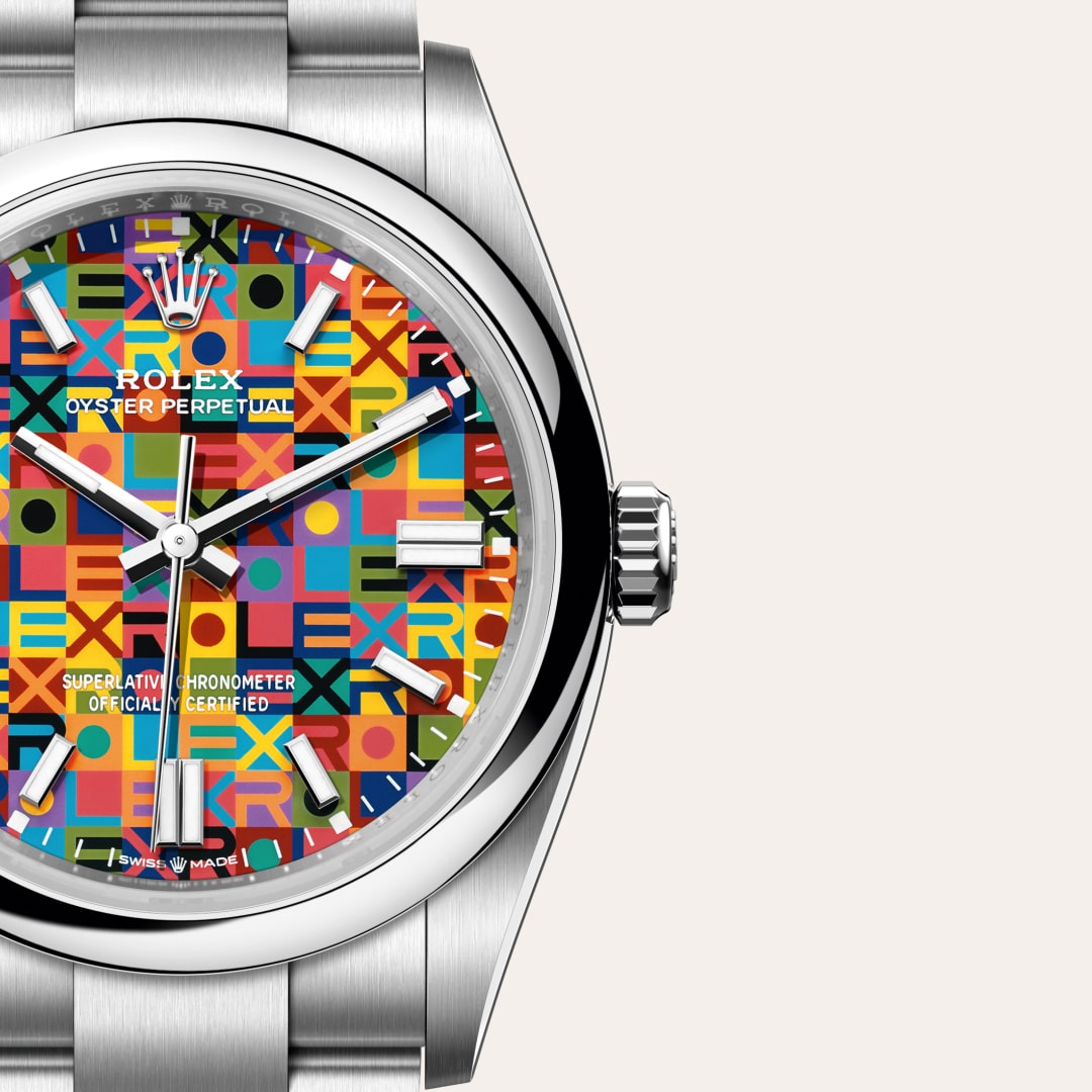 Rolex Oyster Perpetual 36 in Oystersteel with a multicoloured, jubilee motif dial, domed bezel, and Oyster bracelet.