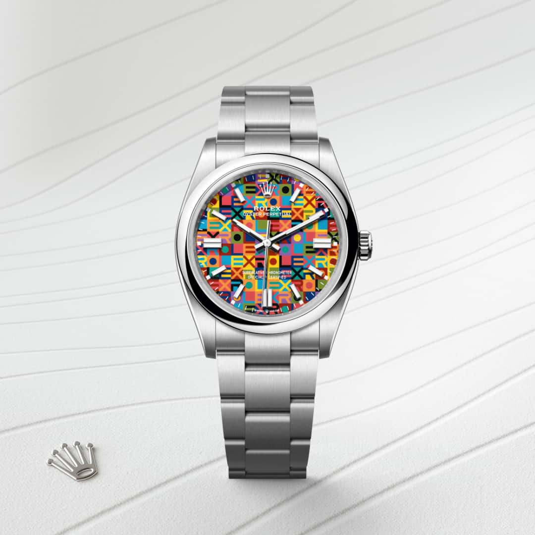 Rolex Oyster Perpetual 36 in Oystersteel with a multicoloured, jubilee motif dial, domed bezel, and Oyster bracelet.