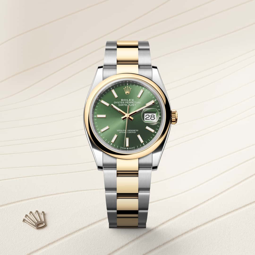 Rolex Datejust 36 in Yellow Rolesor with a olive green dial, domed bezel, and Oyster bracelet.