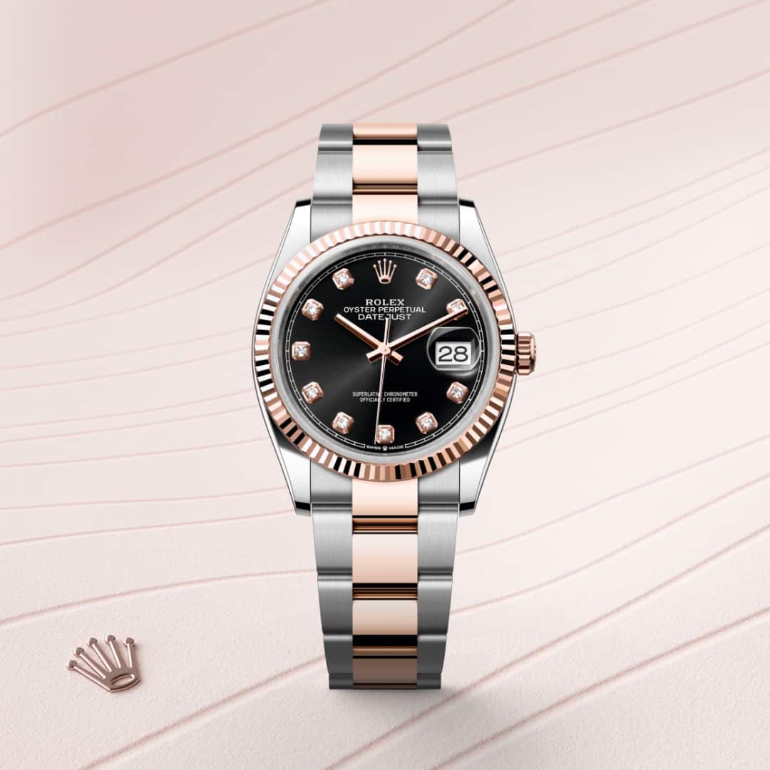 Rolex Datejust 36 in Everose Rolesor with a bright black set with diamonds dial, fluted bezel, and Oyster bracelet.