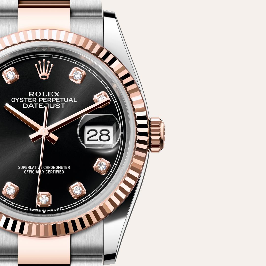 Rolex Datejust 36 in Everose Rolesor with a bright black set with diamonds dial, fluted bezel, and Oyster bracelet.