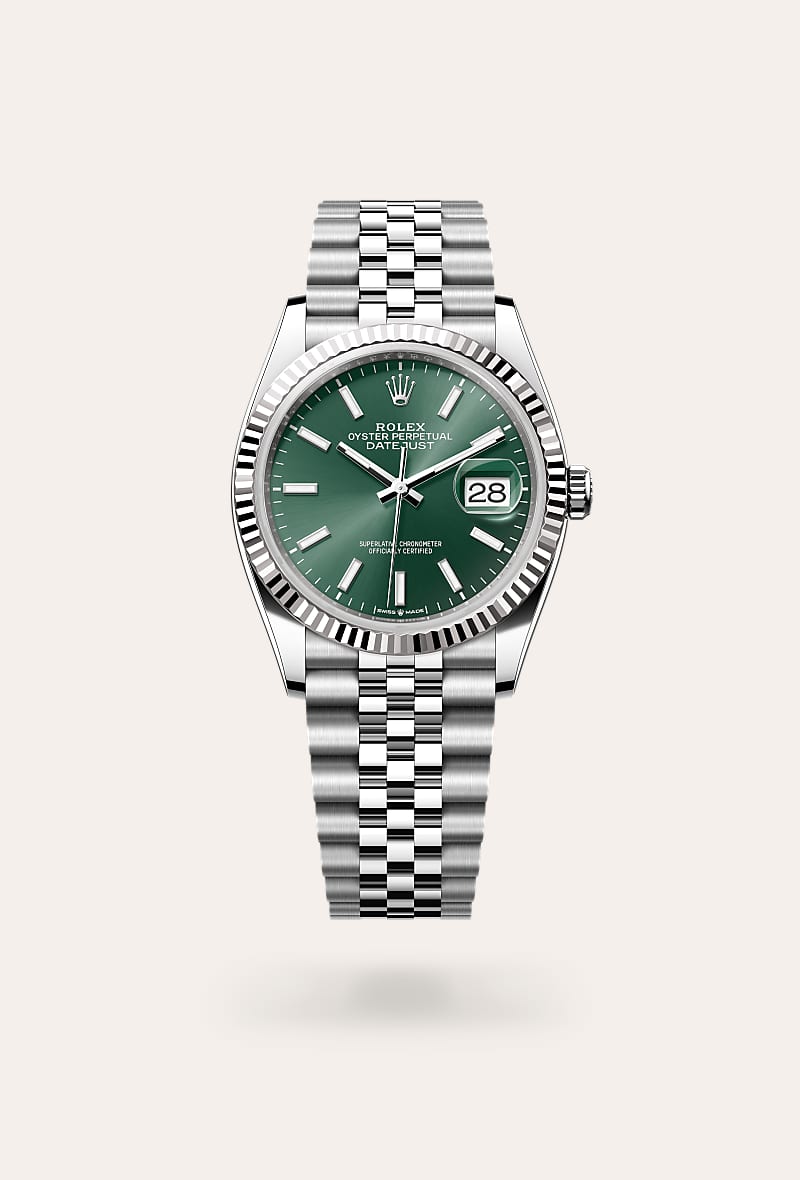 Rolex Datejust 36 in White Rolesor with a mint green dial, fluted bezel, and Jubilee bracelet.