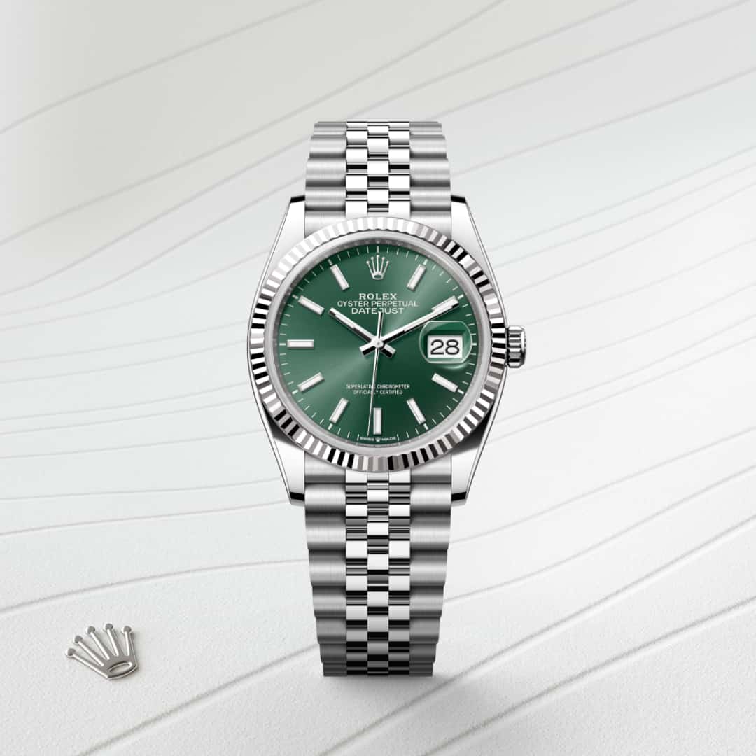 Rolex Datejust 36 in White Rolesor with a mint green dial, fluted bezel, and Jubilee bracelet.