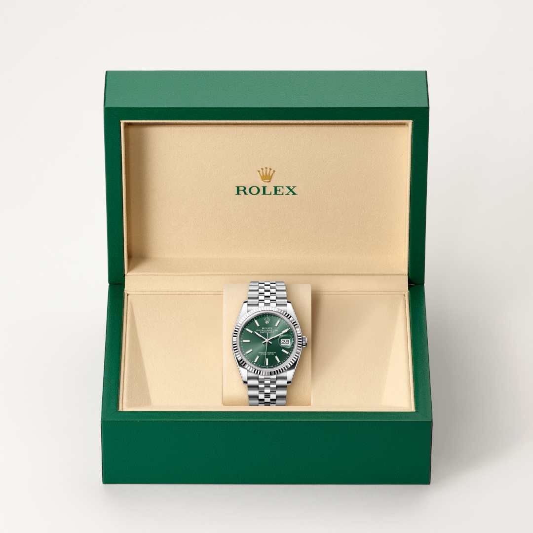Rolex Datejust 36 in White Rolesor with a mint green dial, fluted bezel, and Jubilee bracelet.