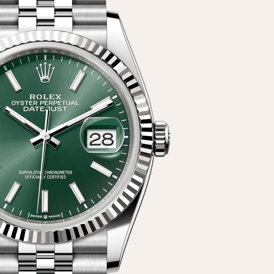 Rolex Datejust 36 in White Rolesor with a mint green dial, fluted bezel, and Jubilee bracelet.