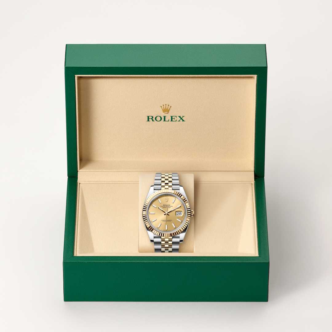 Rolex Datejust 41 in Yellow Rolesor with a champagne-colour dial, fluted bezel, and Jubilee bracelet.