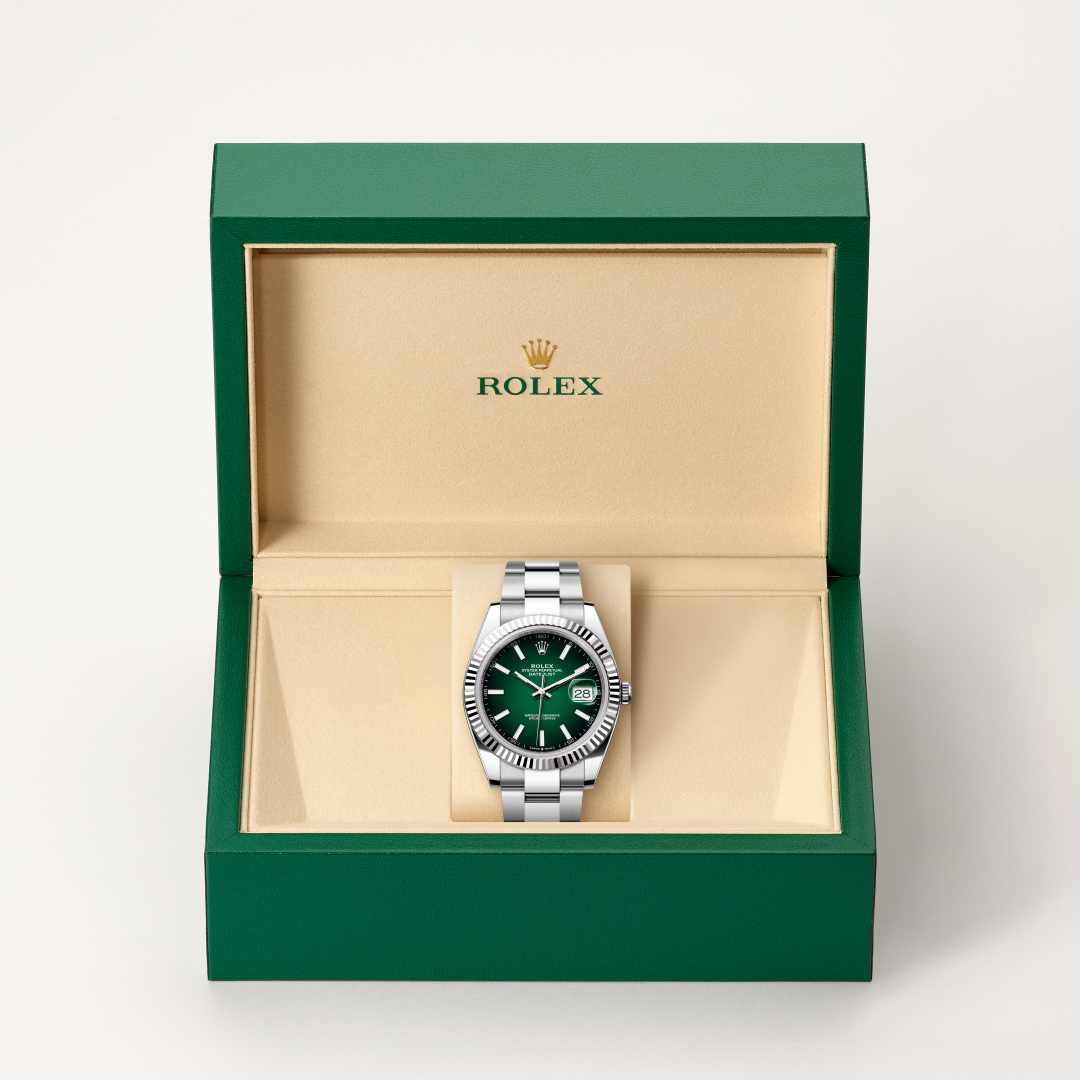 Rolex Datejust 41 in White Rolesor with a green ombré dial, fluted bezel, and Oyster bracelet.