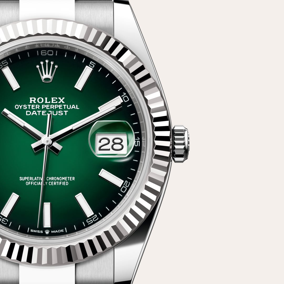 Rolex Datejust 41 in White Rolesor with a green ombré dial, fluted bezel, and Oyster bracelet.