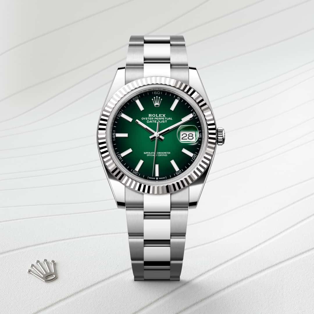 Rolex Datejust 41 in White Rolesor with a green ombré dial, fluted bezel, and Oyster bracelet.