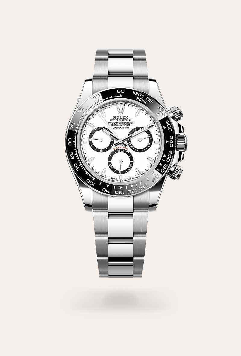 Rolex Cosmograph Daytona in Oystersteel with a white, black counter rings dial, black monobloc cerachrom bezel in ceramic with moulded tachymetric scale bezel, and Oyster bracelet.