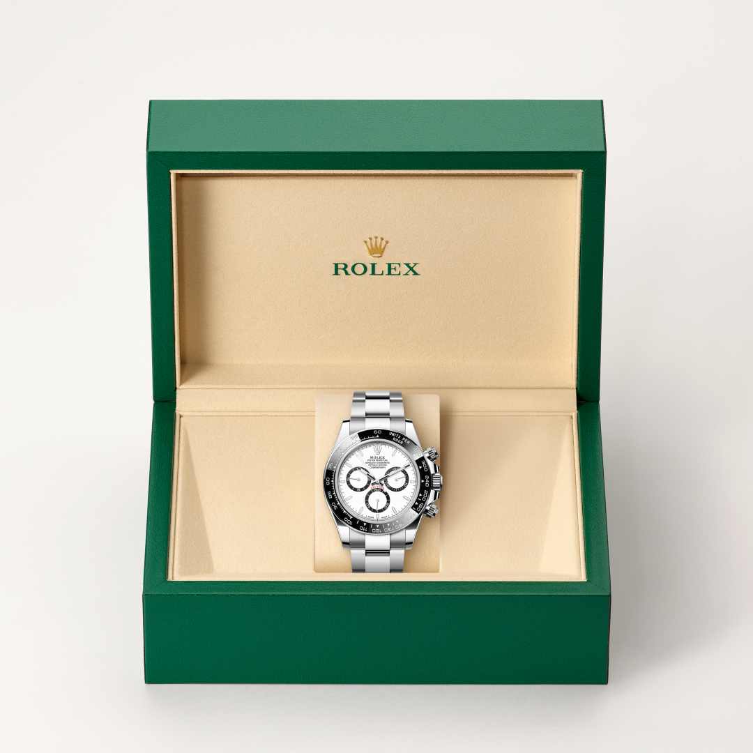 Rolex Cosmograph Daytona in Oystersteel with a white, black counter rings dial, black monobloc cerachrom bezel in ceramic with moulded tachymetric scale bezel, and Oyster bracelet.