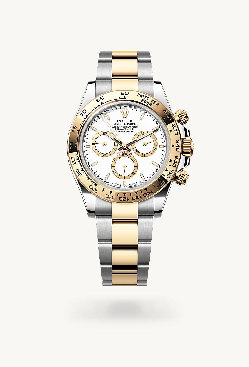 Rolex Cosmograph Daytona in Yellow Rolesor with a white, golden counter rings dial, fixed, with engraved tachymetric scale, in yellow gold bezel, and Oyster bracelet.