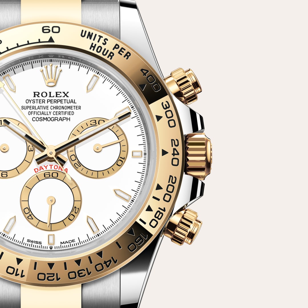 Rolex Cosmograph Daytona in Yellow Rolesor with a white, golden counter rings dial, fixed, with engraved tachymetric scale, in yellow gold bezel, and Oyster bracelet.