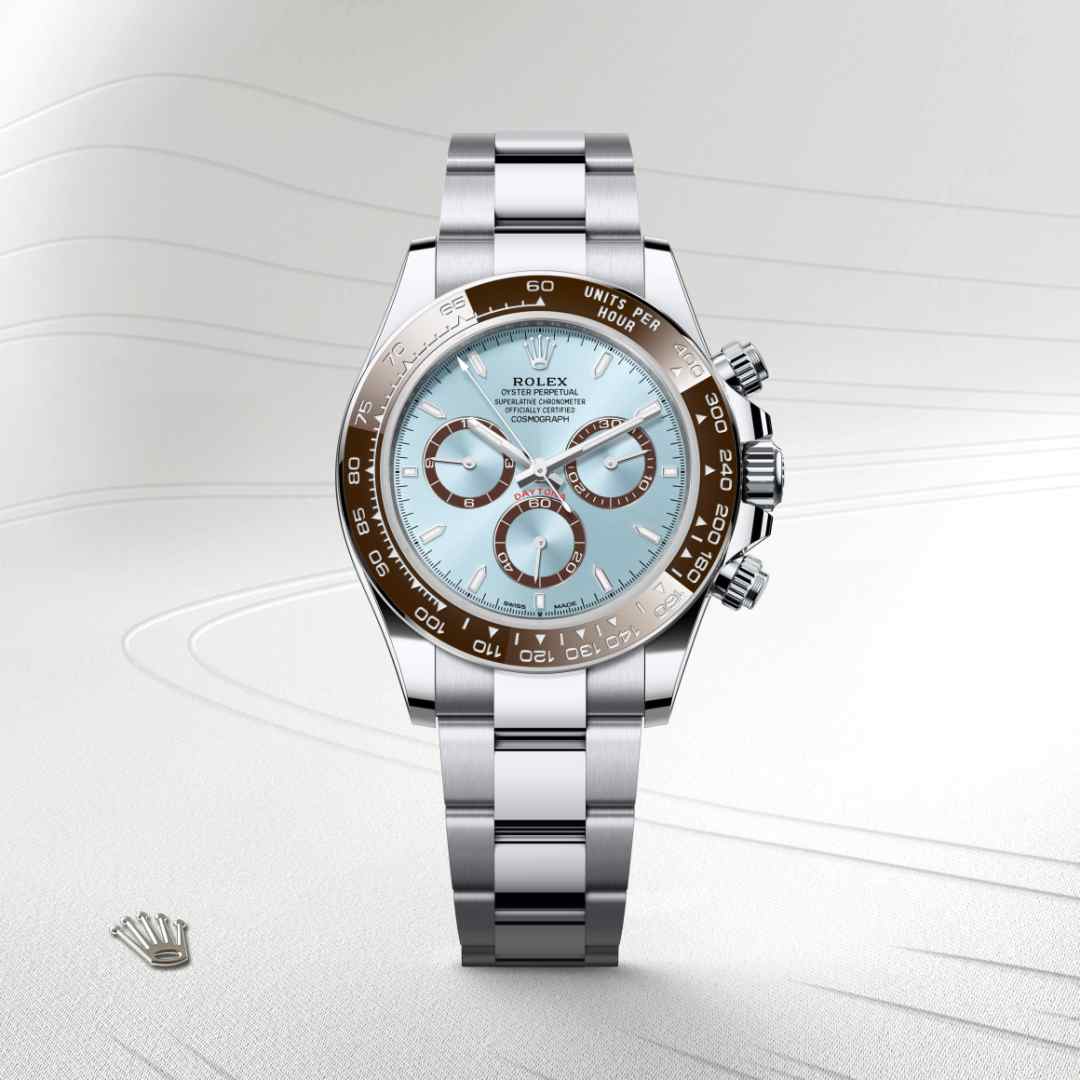 Rolex Cosmograph Daytona in Platinum with a ice blue, chestnut brown counter rings dial, chestnut brown monobloc cerachrom bezel in ceramic with moulded numerals and graduations bezel, and Oyster bracelet.