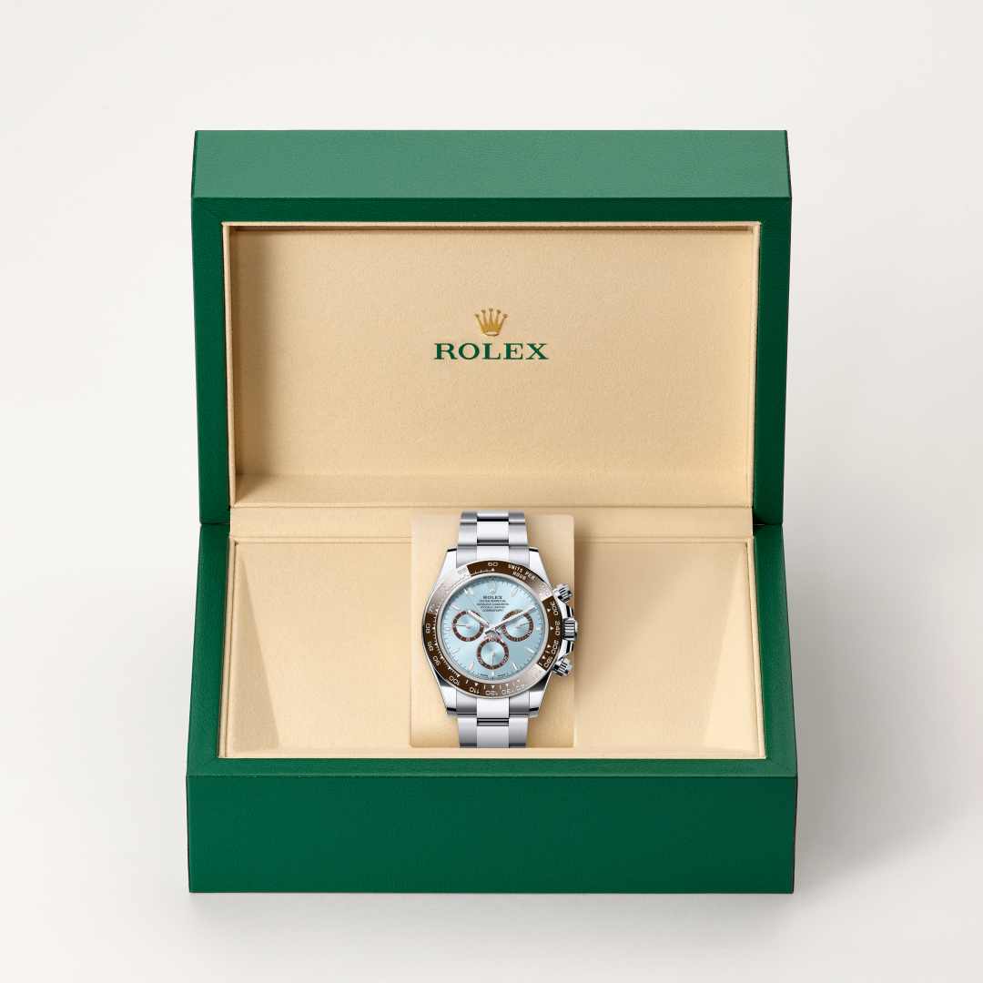 Rolex Cosmograph Daytona in Platinum with a ice blue, chestnut brown counter rings dial, chestnut brown monobloc cerachrom bezel in ceramic with moulded numerals and graduations bezel, and Oyster bracelet.
