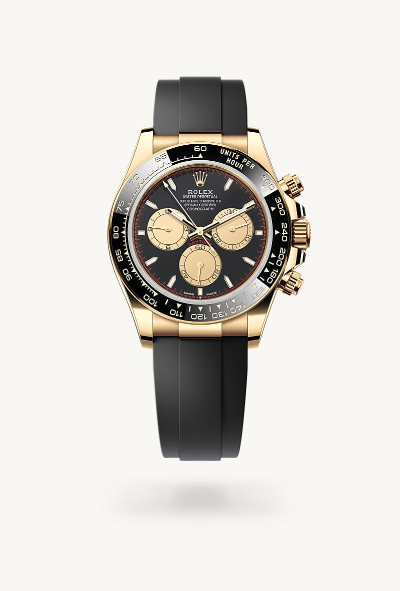 Rolex Cosmograph Daytona in 18 ct yellow gold with a intense black and champagne-colour dial, black monobloc cerachrom bezel in ceramic with moulded tachymetric scale bezel, and Oysterflex bracelet.