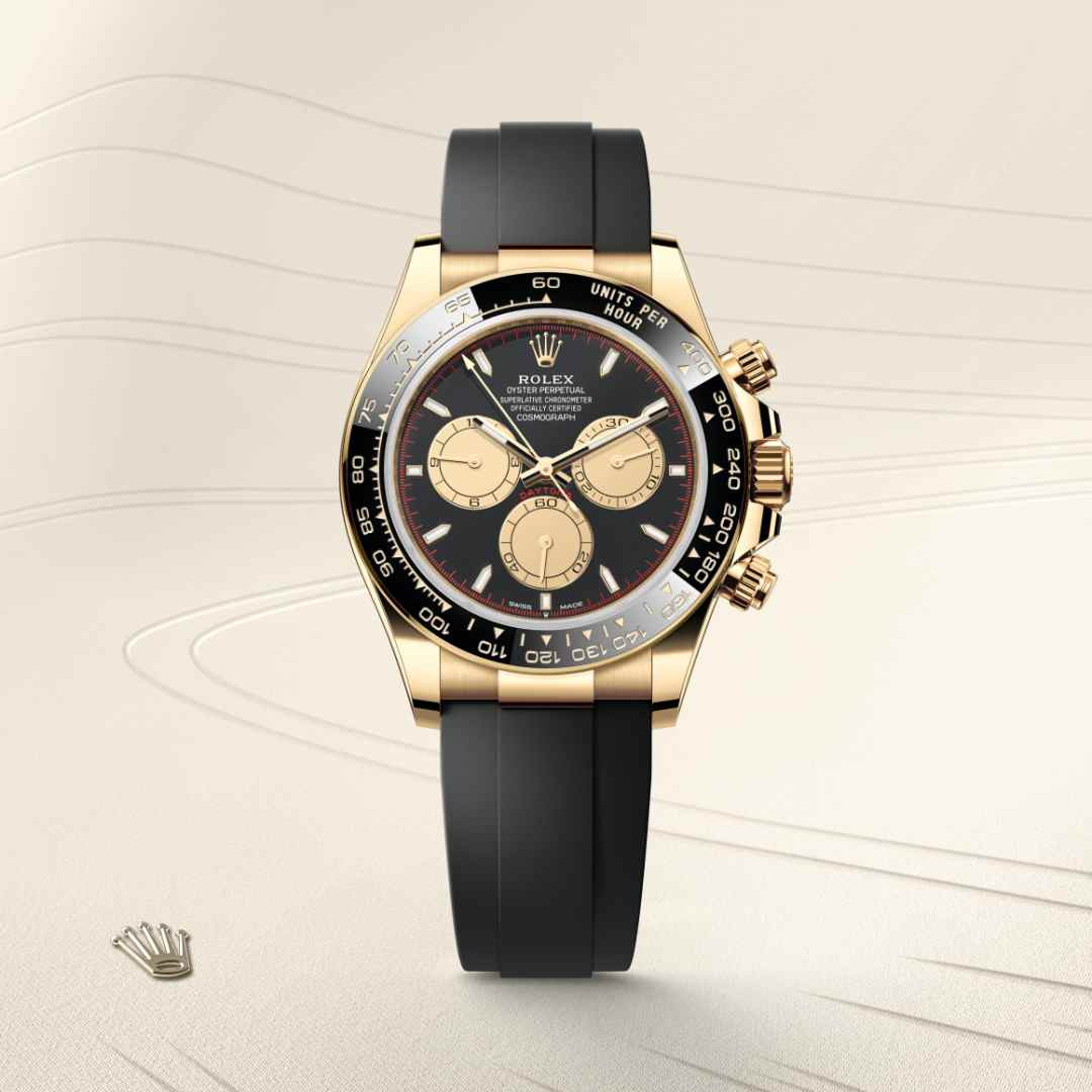 Rolex Cosmograph Daytona in 18 ct yellow gold with a intense black and champagne-colour dial, black monobloc cerachrom bezel in ceramic with moulded tachymetric scale bezel, and Oysterflex bracelet.