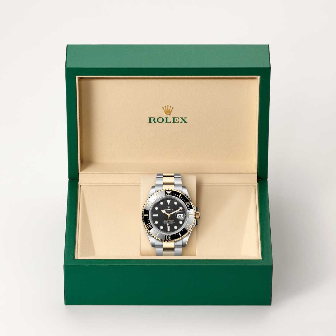 Rolex Sea-Dweller in Yellow Rolesor with a intense black dial, unidirectional rotatable 60-minute graduated, scratch-resistant cerachrom insert in black ceramic, numerals and graduations coated in gold bezel, and Oyster bracelet.