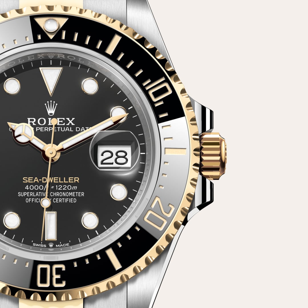 Rolex Sea-Dweller in Yellow Rolesor with a intense black dial, unidirectional rotatable 60-minute graduated, scratch-resistant cerachrom insert in black ceramic, numerals and graduations coated in gold bezel, and Oyster bracelet.