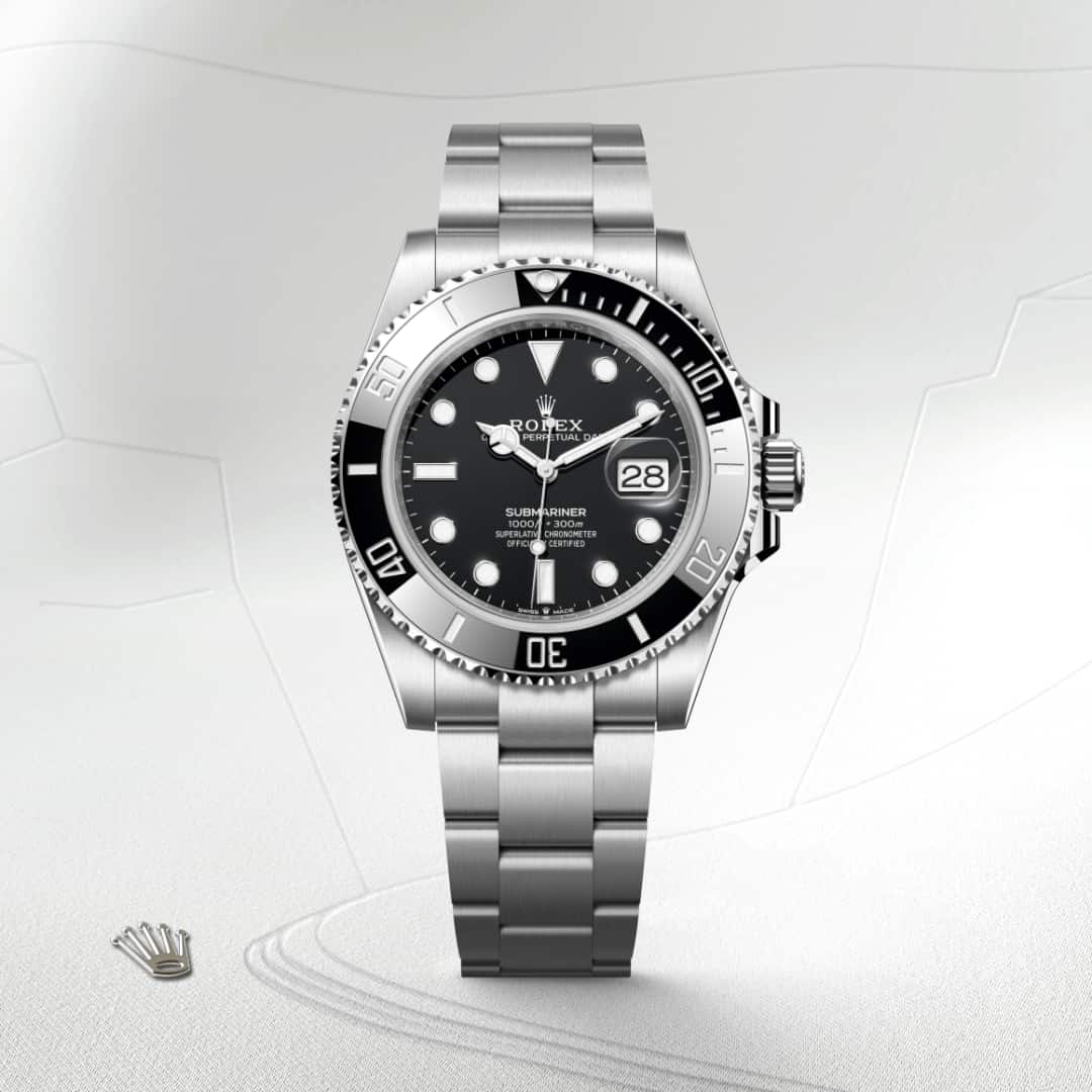 Rolex Submariner Date in Oystersteel with a black dial, unidirectional rotatable 60-minute graduated, scratch-resistant cerachrom insert in black ceramic, numerals and graduations coated in platinum bezel, and Oyster bracelet.