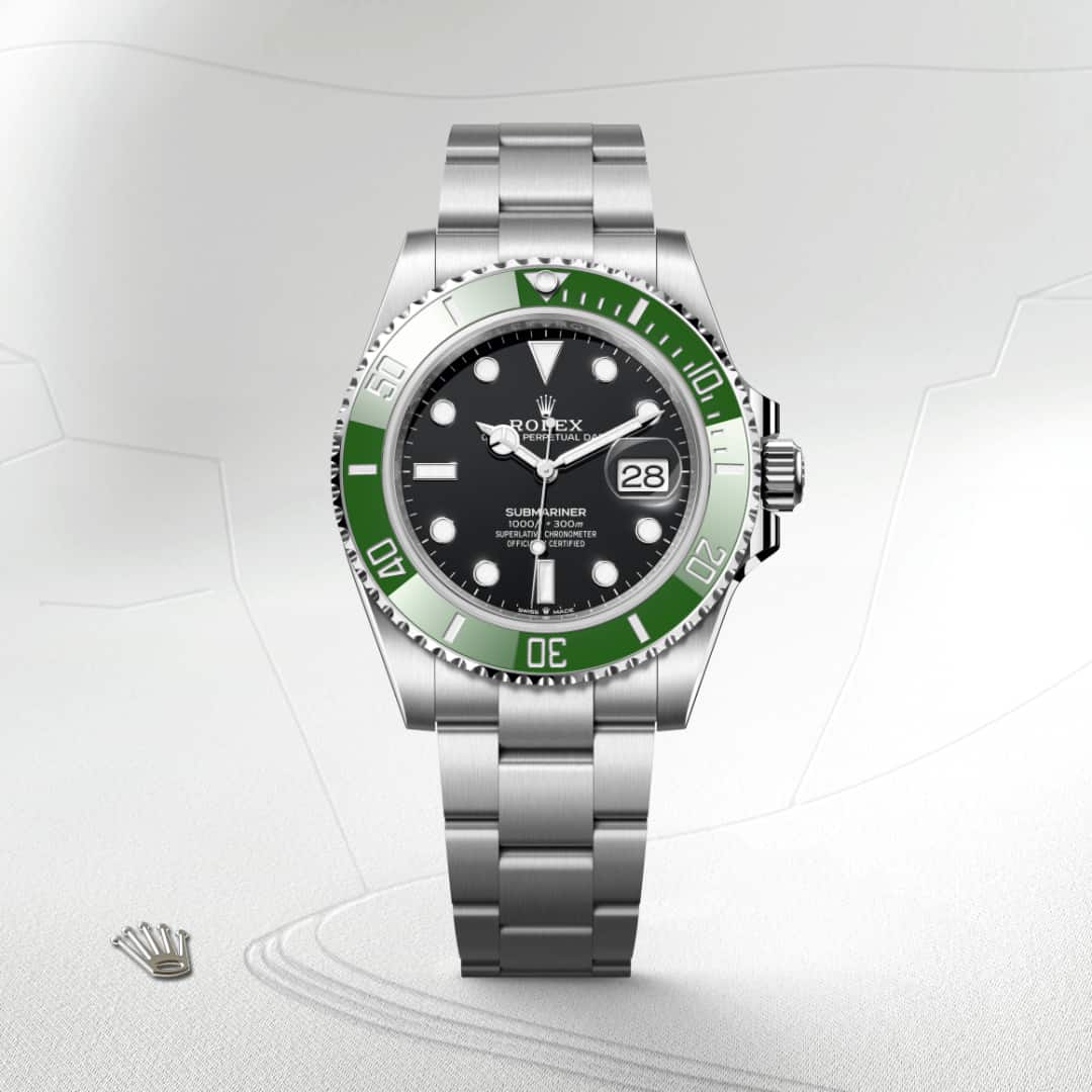 Rolex Submariner Date in Oystersteel with a black dial, unidirectional rotatable 60-minute graduated, scratch-resistant cerachrom insert in green ceramic, numerals and graduations coated in platinum bezel, and Oyster bracelet.
