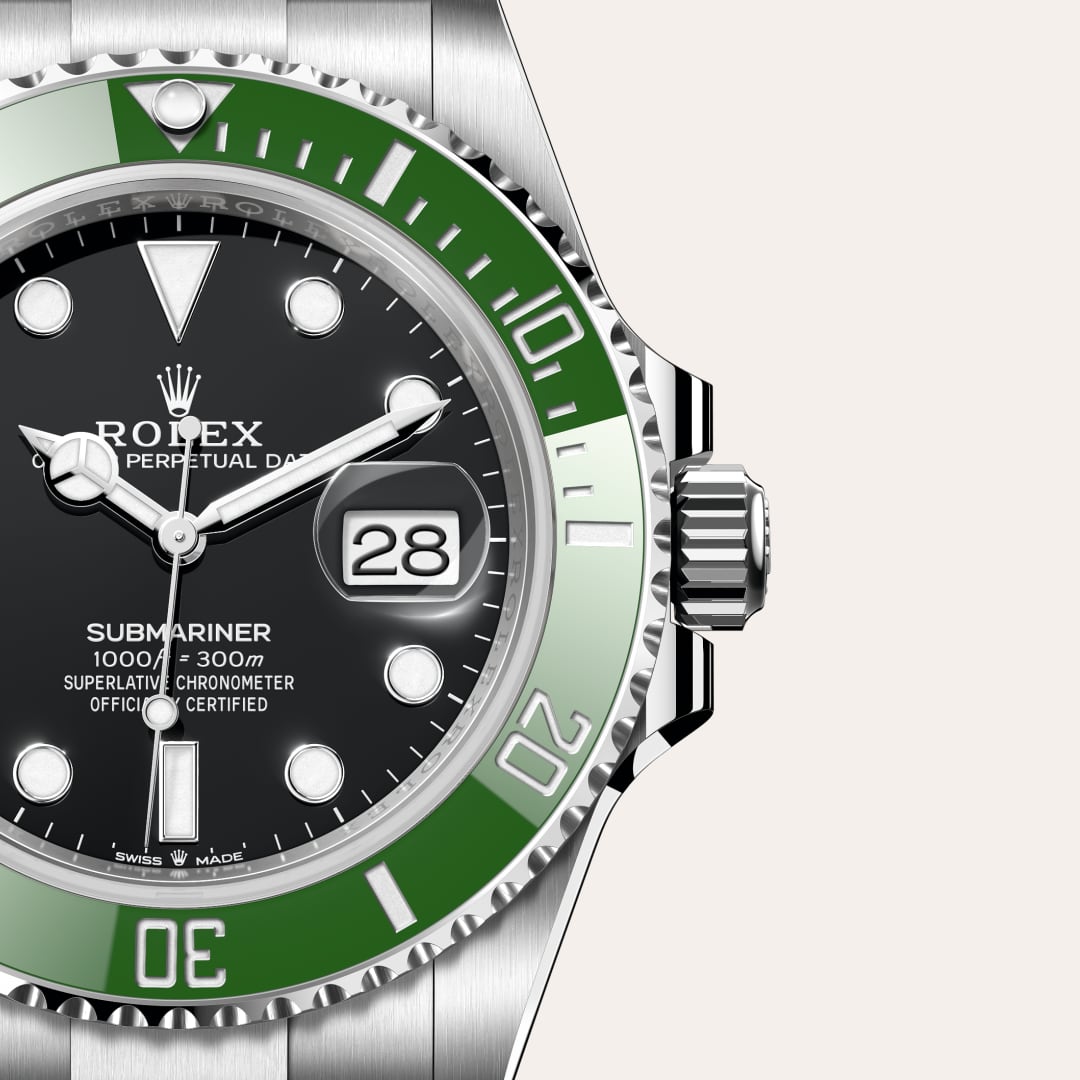 Rolex Submariner Date in Oystersteel with a black dial, unidirectional rotatable 60-minute graduated, scratch-resistant cerachrom insert in green ceramic, numerals and graduations coated in platinum bezel, and Oyster bracelet.