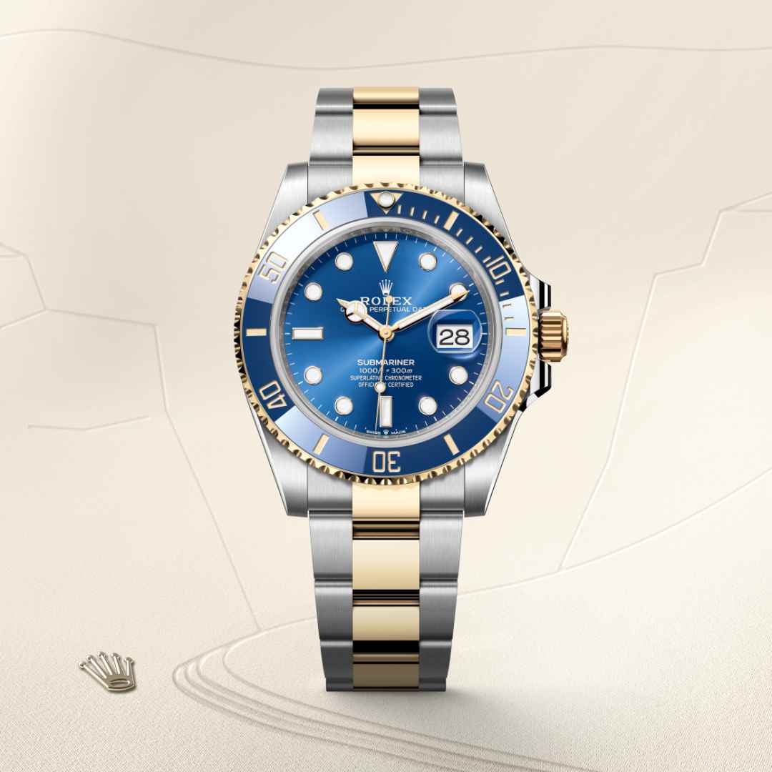 Rolex Submariner Date in Yellow Rolesor with a royal blue dial, unidirectional rotatable 60-minute graduated, scratch-resistant cerachrom insert in blue ceramic, numerals and graduations coated in gold bezel, and Oyster bracelet.