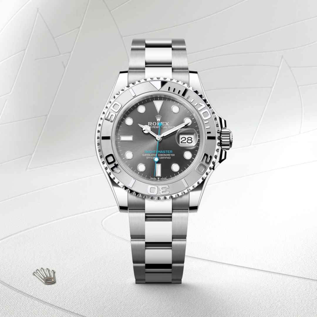 Rolex Yacht-Master 40 in Rolesium with a slate dial, 950 platinum bidirectional rotatable 60-minute graduated with raised numerals bezel, and Oyster bracelet.