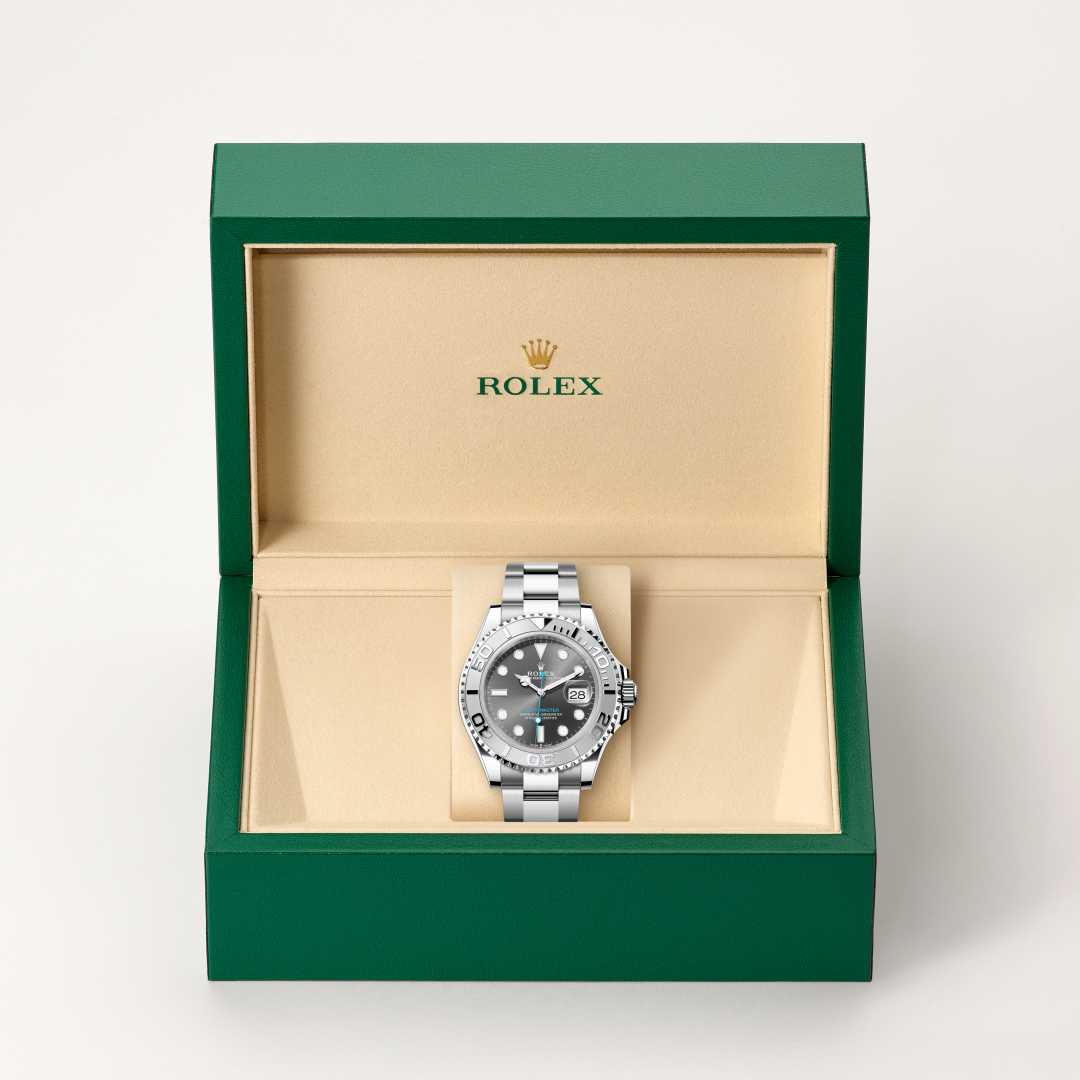 Rolex Yacht-Master 40 in Rolesium with a slate dial, 950 platinum bidirectional rotatable 60-minute graduated with raised numerals bezel, and Oyster bracelet.