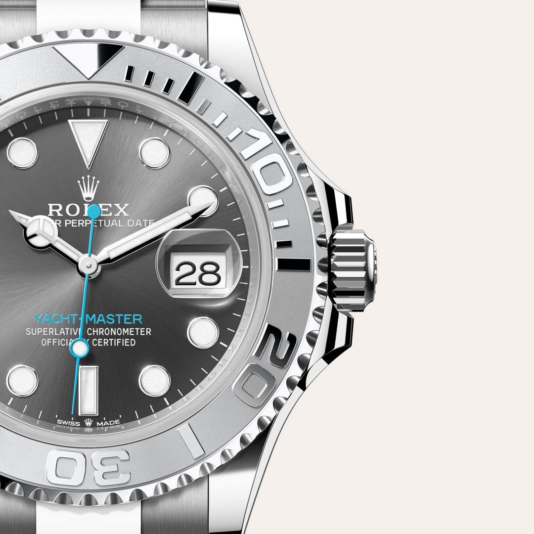 Rolex Yacht-Master 40 in Rolesium with a slate dial, 950 platinum bidirectional rotatable 60-minute graduated with raised numerals bezel, and Oyster bracelet.