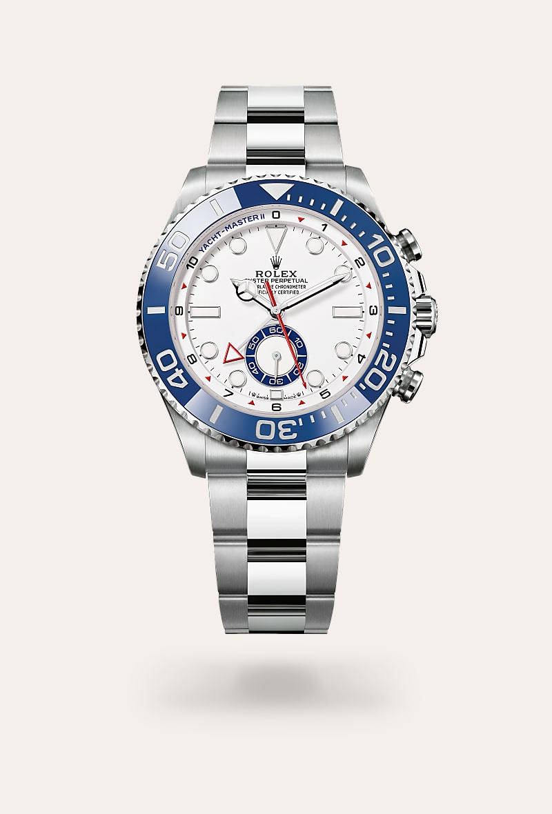 Rolex Yacht-Master II in Oystersteel with a white dial, bidirectional rotatable 60-minute graduated bezel with blue cerachrom insert in ceramic. moulded, recessed graduations and numerals coated with platinum bezel, and Oyster bracelet.