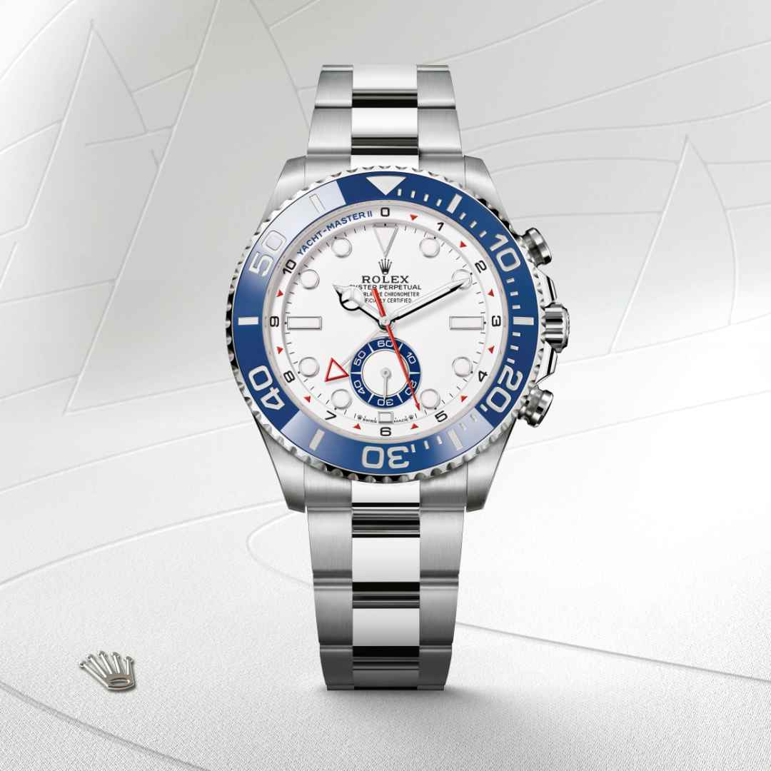 Rolex Yacht-Master II in Oystersteel with a white dial, bidirectional rotatable 60-minute graduated bezel with blue cerachrom insert in ceramic. moulded, recessed graduations and numerals coated with platinum bezel, and Oyster bracelet.