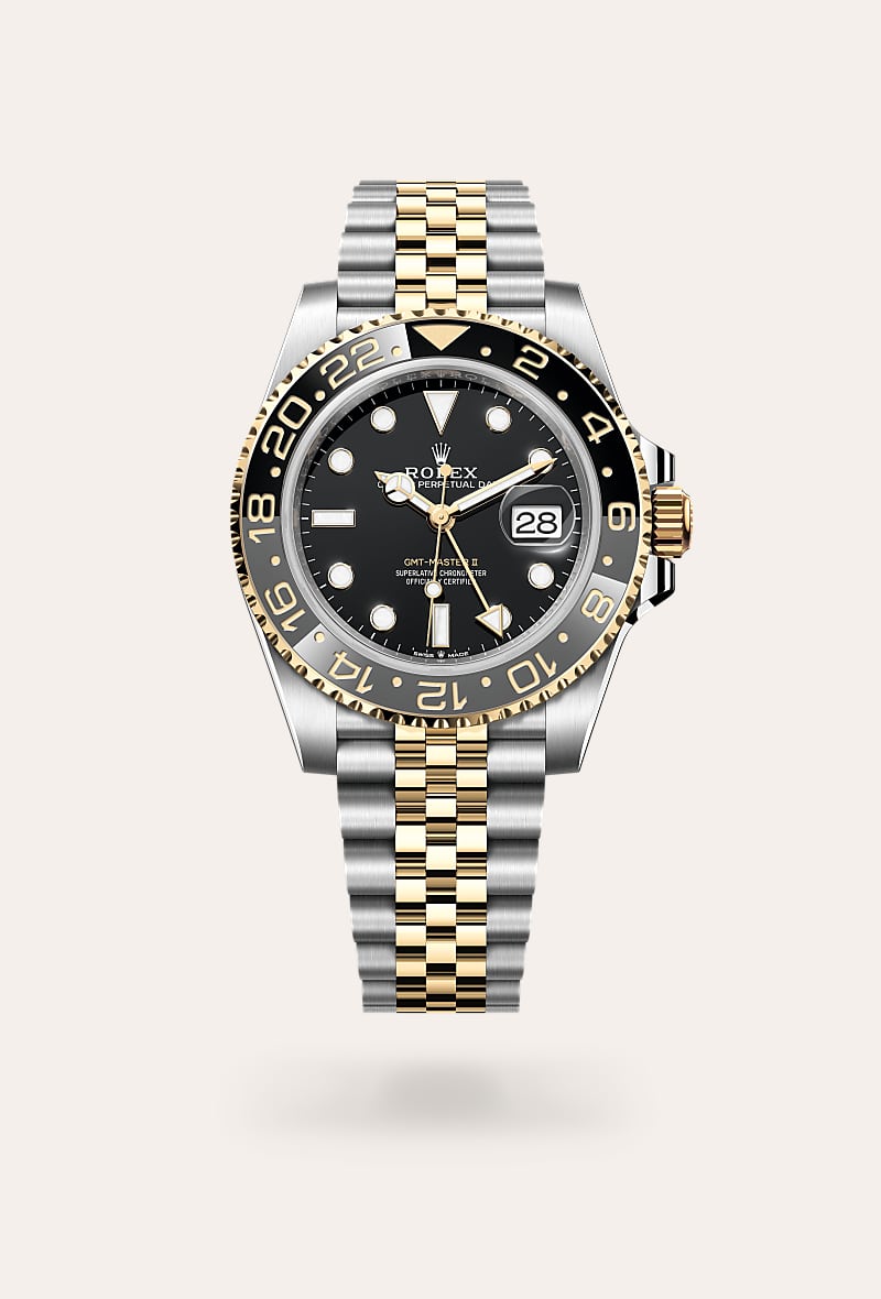 Rolex GMT-Master II in Yellow Rolesor with a black dial, bidirectional rotatable 24-hour graduated bezel. two-colour grey and black cerachrom insert in ceramic, moulded numerals and graduations bezel, and Jubilee bracelet.