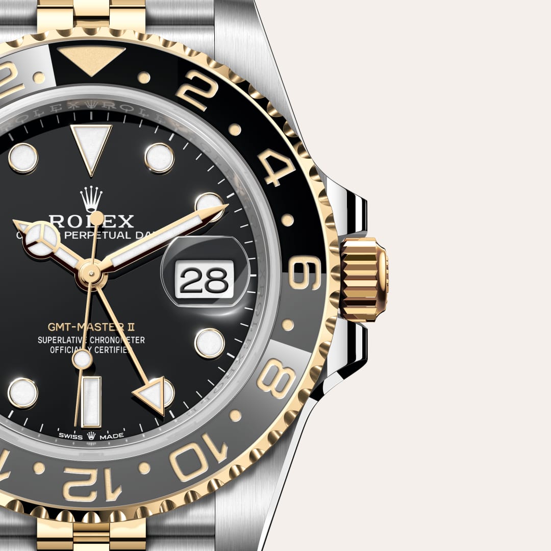 Rolex GMT-Master II in Yellow Rolesor with a black dial, bidirectional rotatable 24-hour graduated bezel. two-colour grey and black cerachrom insert in ceramic, moulded numerals and graduations bezel, and Jubilee bracelet.
