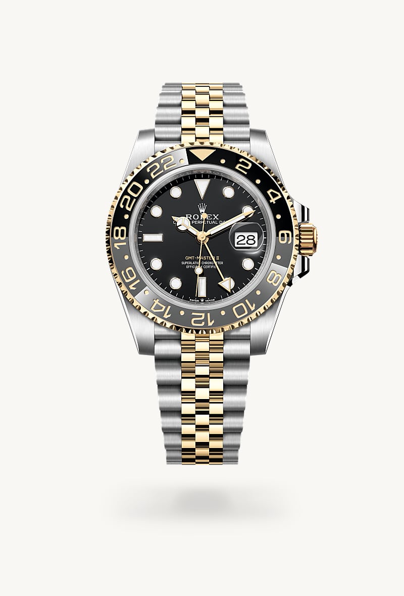 Rolex GMT-Master II in Yellow Rolesor with a black dial, bidirectional rotatable 24-hour graduated bezel. two-colour grey and black cerachrom insert in ceramic, moulded numerals and graduations bezel, and Jubilee bracelet.