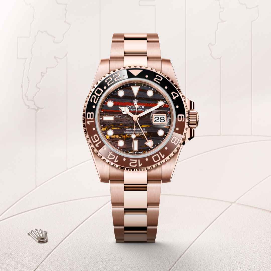 Rolex GMT-Master II in 18 kt Everose gold with a tiger iron dial, bidirectional rotatable 24-hour graduated bezel. two-colour brown and black cerachrom insert in ceramic, moulded numerals and graduations bezel, and Oyster bracelet.