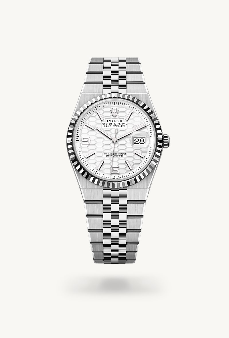 Rolex Land-Dweller 36 in White Rolesor with a intense white, honeycomb motif dial, fluted bezel, and Flat Jubilee bracelet.
