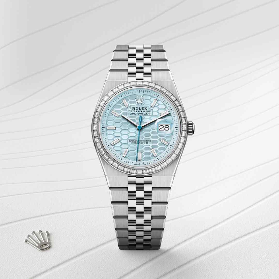 Rolex Land-Dweller 36 in Platinum with a ice blue, honeycomb motif set with diamonds dial, set with diamonds bezel, and Flat Jubilee bracelet.