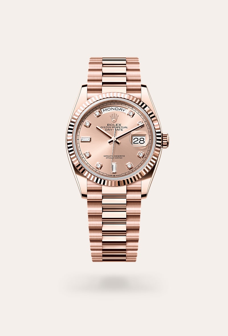 Rolex Day-Date 36 in 18 ct Everose gold with a ros&eacute;-colour set with diamonds dial, fluted bezel, and President bracelet.