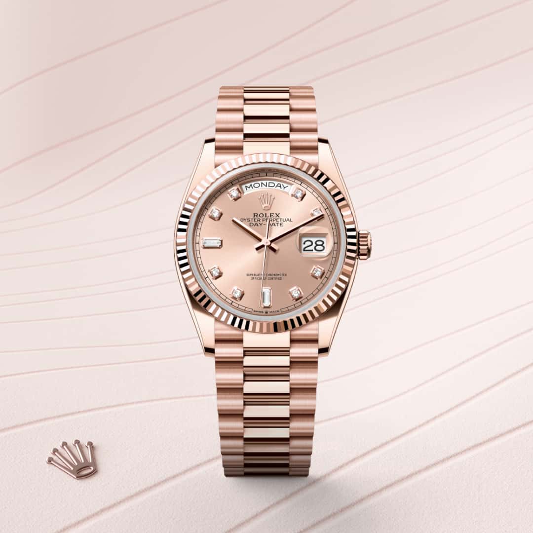 Rolex Day-Date 36 in 18 ct Everose gold with a rosé-colour set with diamonds dial, fluted bezel, and President bracelet.