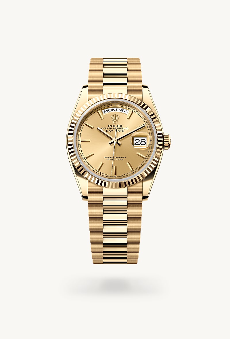 Rolex Day-Date 36 in 18 kt yellow gold with a champagne-colour dial, fluted bezel, and President bracelet.