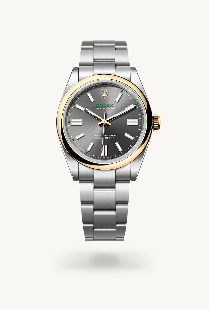 Rolex Oyster Perpetual 41 in Yellow Rolesor with a slate dial, domed bezel, and Oyster bracelet.